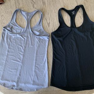 Champion athletic duo/dry razorback tanks. Size Large. Grey and Black tanks